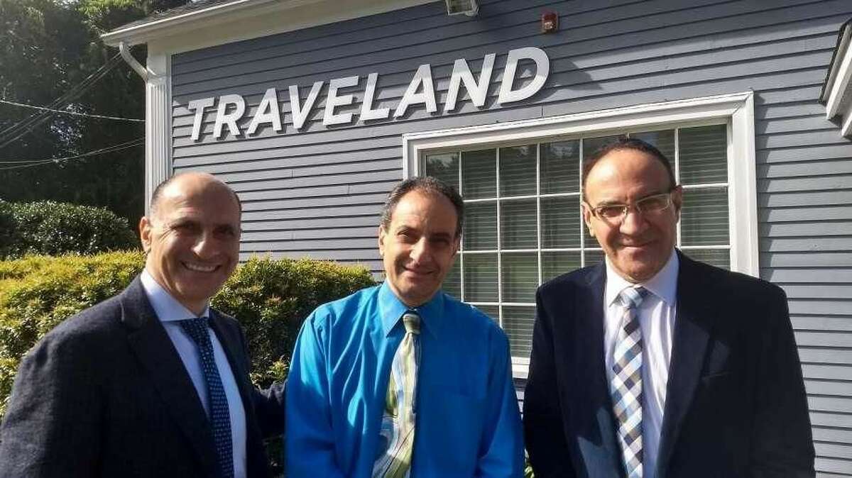 From left, Tamir, Oded and Eitan Battat just expanded their Traveland office in a move to Orange.