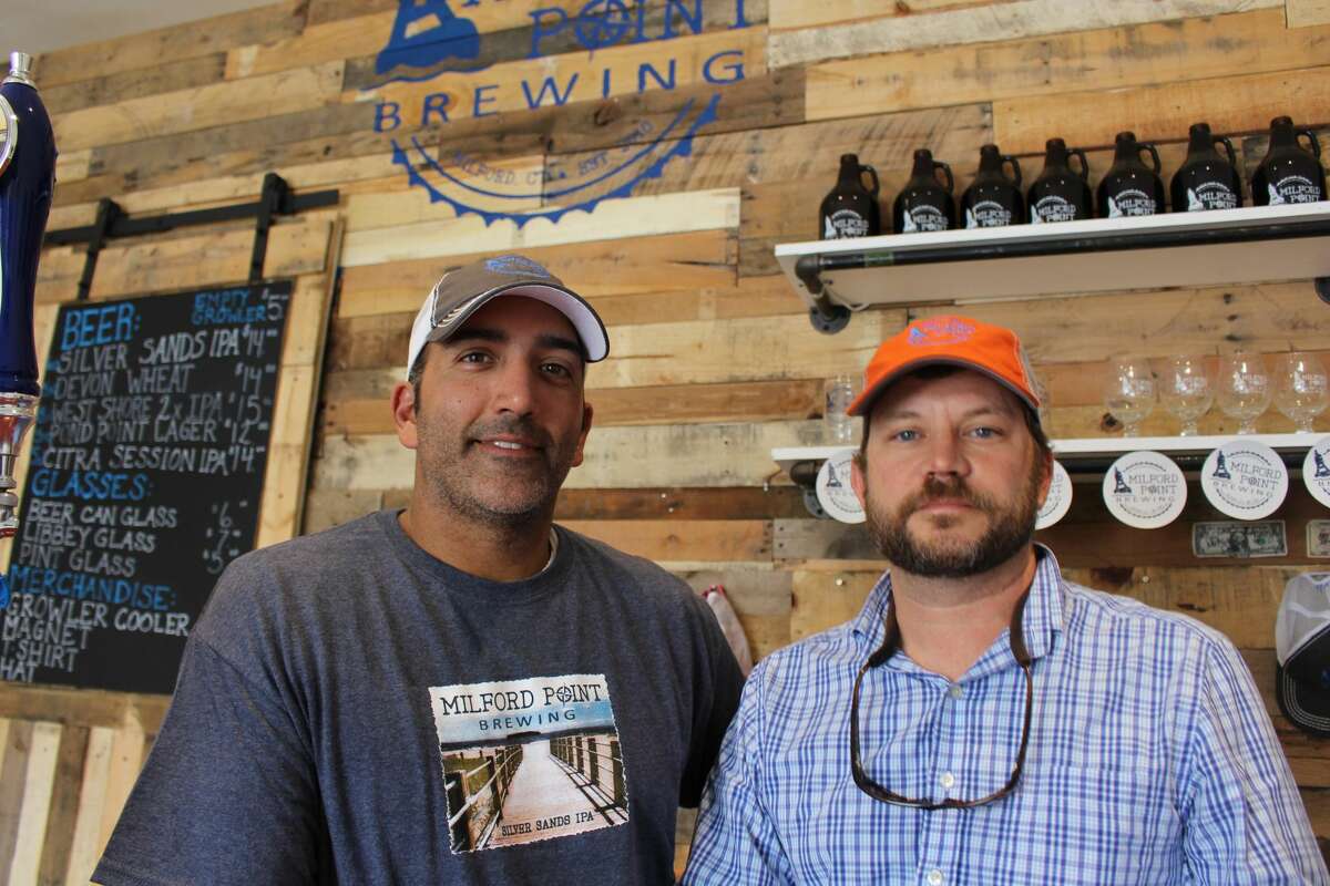 Jerry Candido, left, and Chris Willett are the owners of Milford Point Brewing Co.