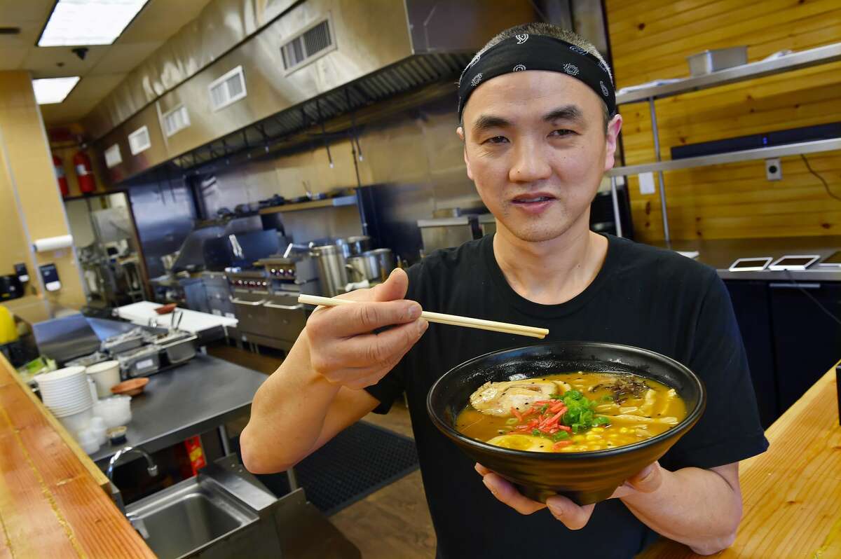 Orange resident Jimmy Pin, co-owner of Hokkaido Ramen at 297 Boston Post Road in Orange, displays a bowl of spicy miso ramen.