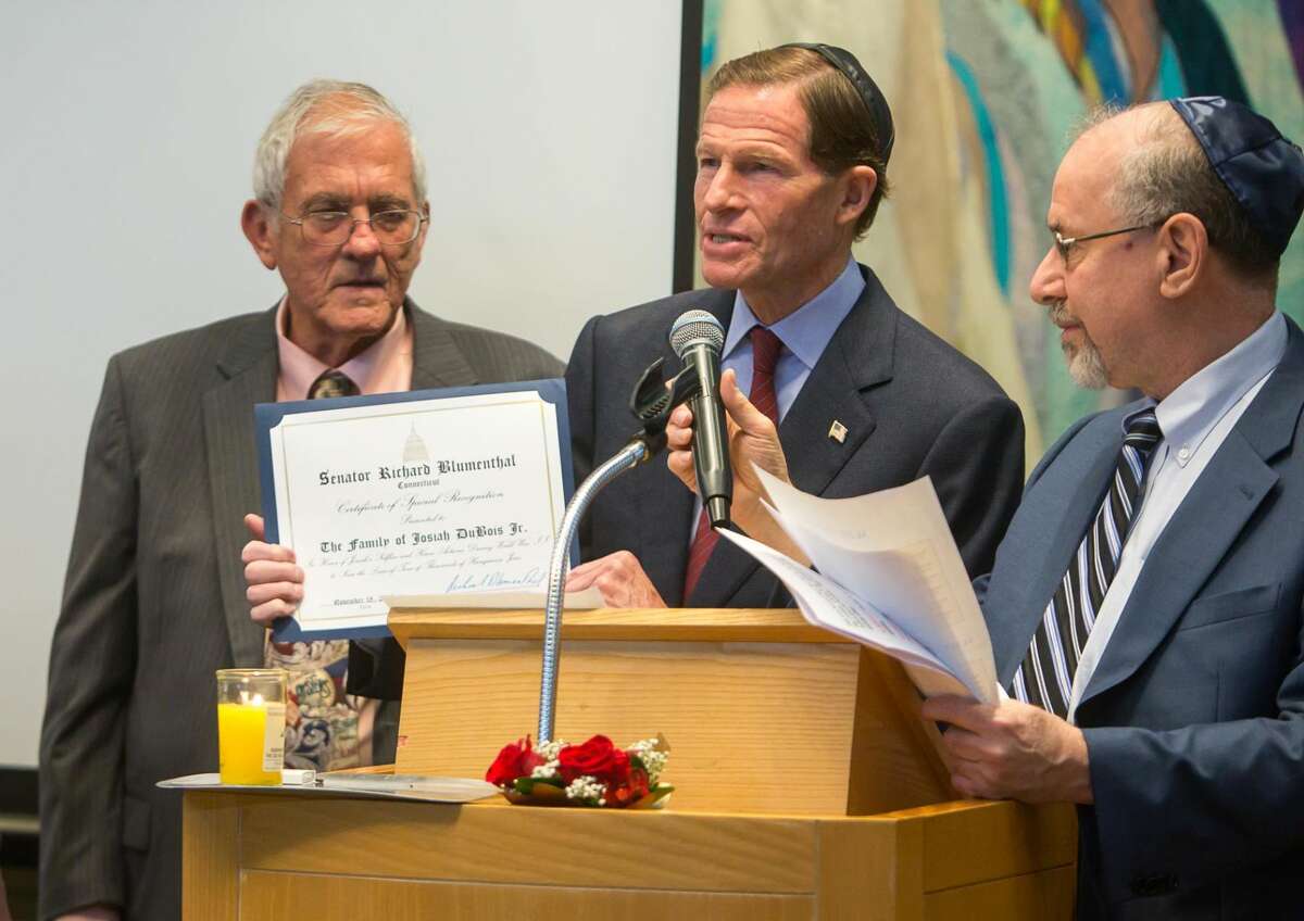 Sen. Richard Blumenthal, center, and Rabbi Alvin Wainhaus, right, present a Senatorial Citation to Robert DuBois, son of Josiah Dubois.