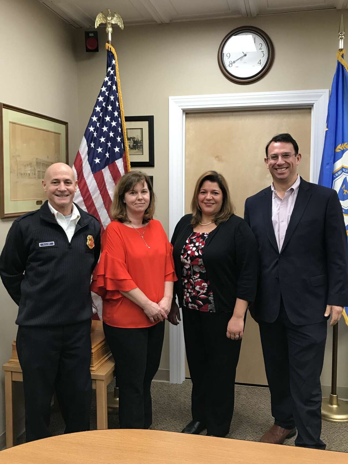 From left, Fire Chief Doug Edo, Gloria Gouse, HR Director Tania Barnes and Mayor Ben Blake.
