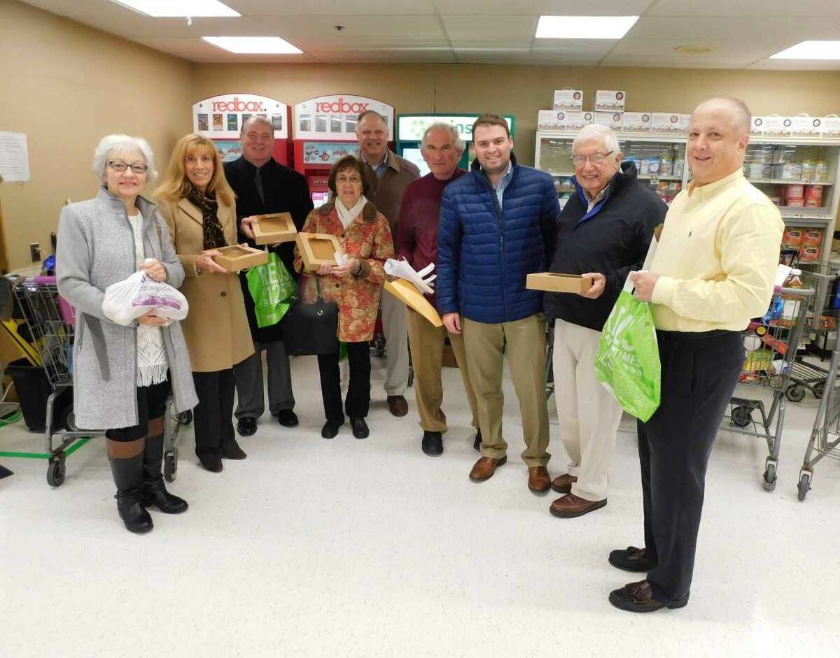 From left, Woodbridge Youth Services Director Nancy Pfund, Rotarians Mary Ellen LaRocca, Tony Anastasio, Dorothy Martino, Buddy DeGennaro, former Rotarian Peter Lerner who co-chaired the project, Woodbridge Rotary Club President Spencer Rubin, and Rotarians Dr. Guy Stella and Tom Shernow.