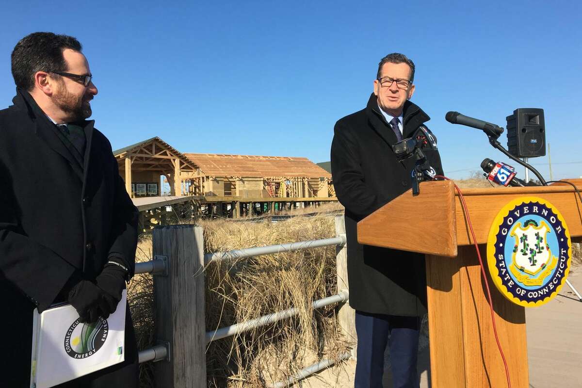 Gov. Dannel P. Malloy, right, and Commissioner of Energy and Environmental Protection Rob Klee, during a ceremony Monday, Dec. 10, commemorating the $10-million renovation and construction at Silver Sands State Park in Milford.