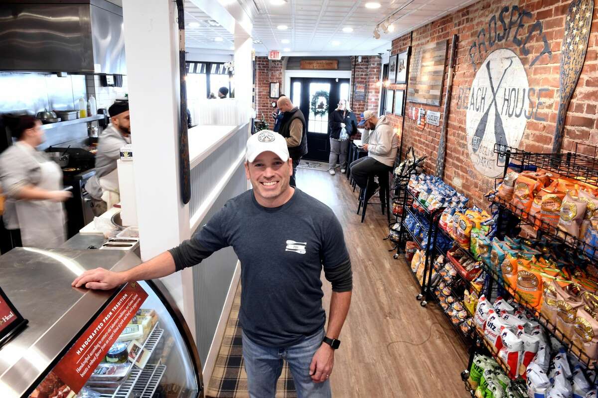 Chris Walsh, owner of Prospect Beach House Deli, in the new eatery on Ocean Ave. in West Haven.