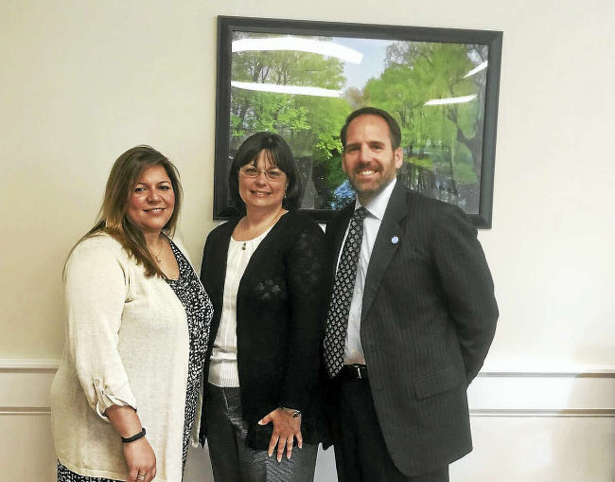 From left, Milford Human Resources Director Tania Barnes, Lynn Kelliher and City Attorney Jon Berchem.
