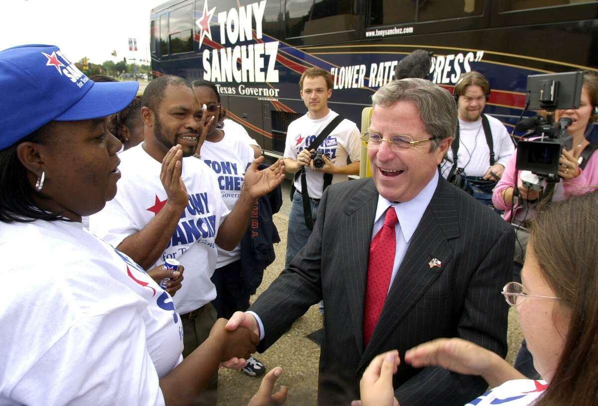 Texas Democratic gubernatorial candidate Tony Sanchez is greeted by supporters at the State Fair in Dallas during his unsuccessful challenge of Gov. Rick Perry in 2002. (AP Photo/LM Otero)