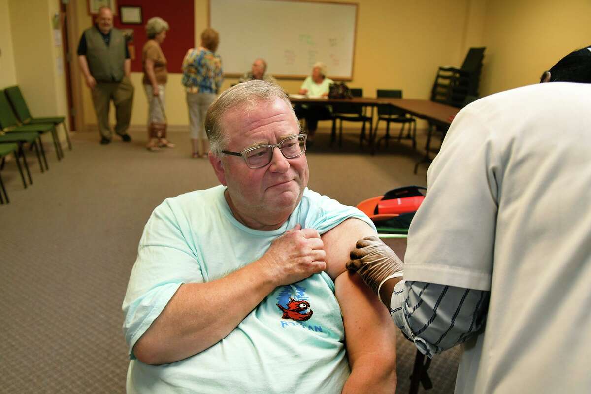 Wayne Parcel, of Cypress, gets a Shingles vaccination at Cypress United Methodist Church on Oct. 10, 2019.