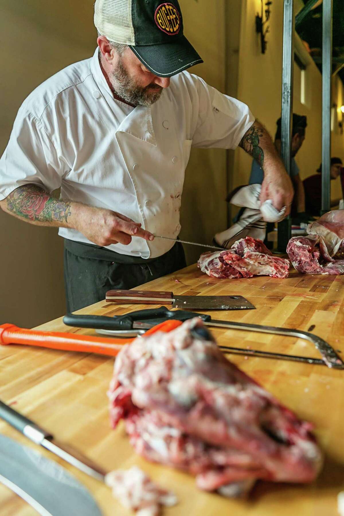 The fourth annual Butcher's Ball, showcasing ethical and sustainable ranching and farming in Texas, will be held Oct. 20, 2019 in Brenham. Shown: Chef Richard Knight carving.