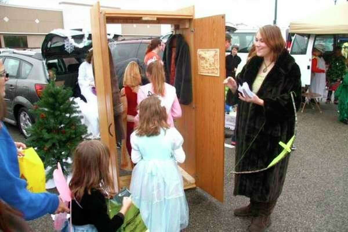 Also during the Fall Festival, kids will have the opportunity to dress up in their favorite costumes and take part in the trunk-or-treat festivities. Featured is a photo of the trunk-or-treat during a previous year. (Pioneer file photo)