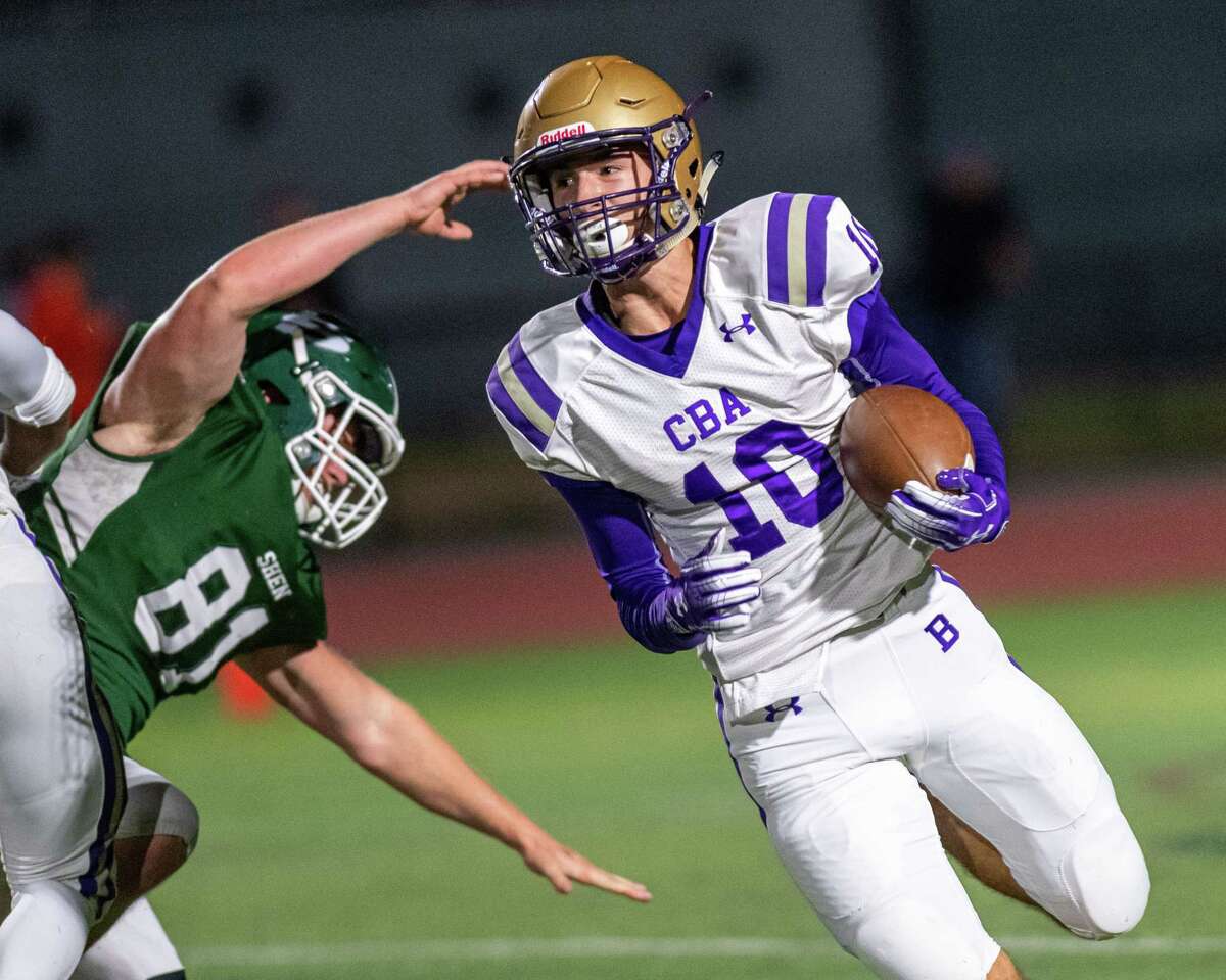 CBA receiver Dylan Jones picks up yardage against Shenendehowa during a game at Shenendehowa High School on Friday, Oct. 11, 2019 (Jim Franco/Special to the Times Union.)