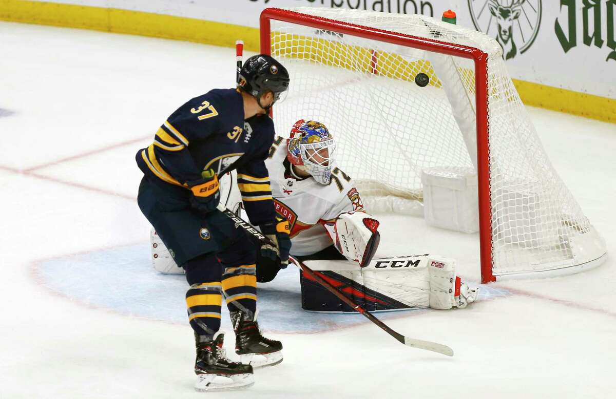 Buffalo Sabres forward Casey Mittelstadt (37) scores against Florida Panthers goalie Sergei Bobrovsky (72) in a shootout of an NHL hockey game, Friday, Oct. 11, 2019, in Buffalo, N.Y. (AP Photo/Jeffrey T. Barnes)