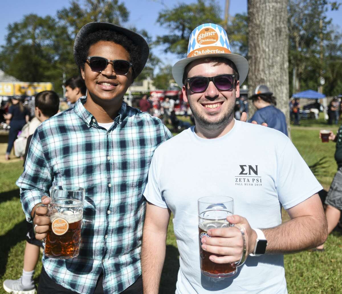 People enjoy beer, food and live music at Beaumont's Oktoberfest Saturday afternoon. Photo taken on Saturday, 10/12/19. Ryan Welch/The Enterprise