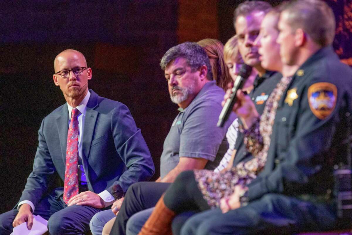 Tyler Dunman, Montgomery County assistant district attorney, listens as a panel of experts speaks during the inaugural Montgomery County Coalition Against Human Trafficking anti-human trafficking community event Thursday, October 10, 2019 at The Woodlands United Methodist Church in The Woodlands.