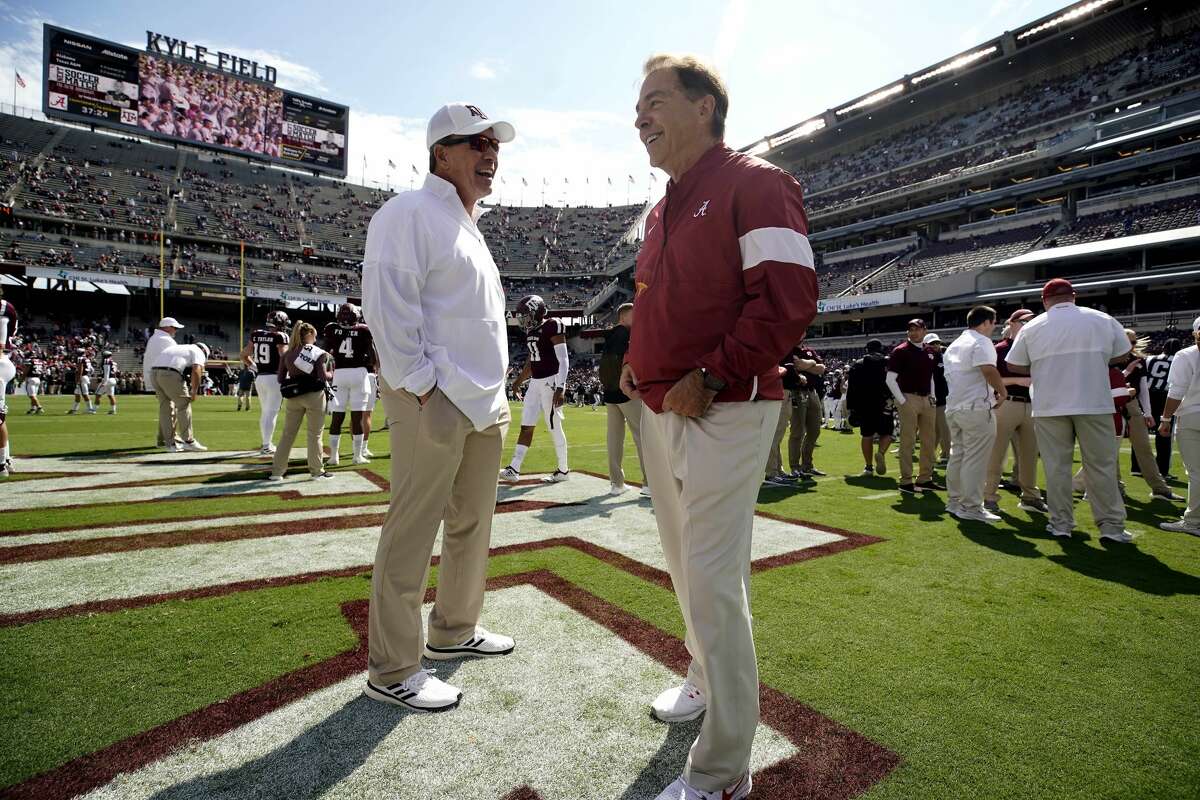 Texas A&M head coach Jimbo Fisher, left, talks to Alabama head coach Nick Saban before the start of an NCAA college football game, Saturday, Oct. 12, 2019, in College Station, Texas. (AP Photo/Sam Craft)