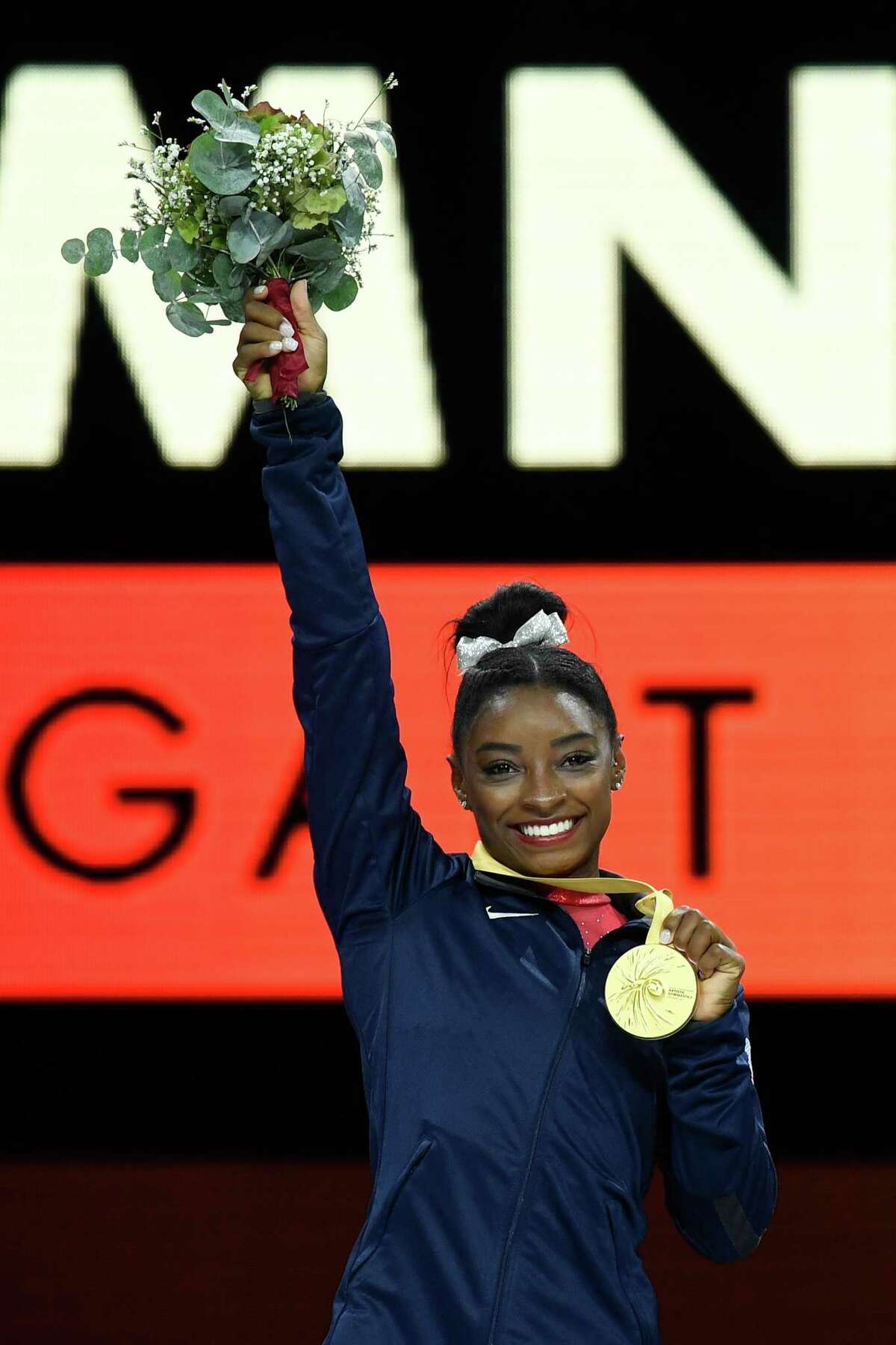 Biles ties medals record at worlds