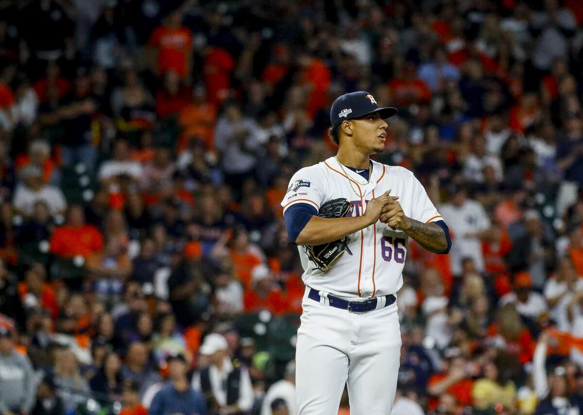 Houston Astros relief pitcher Bryan Abreu reacts after the last out of a  baseball game against the New York Yankees at Yankee Stadium, Sunday, Aug.  6, 2023, in New York. (AP Photo/Seth