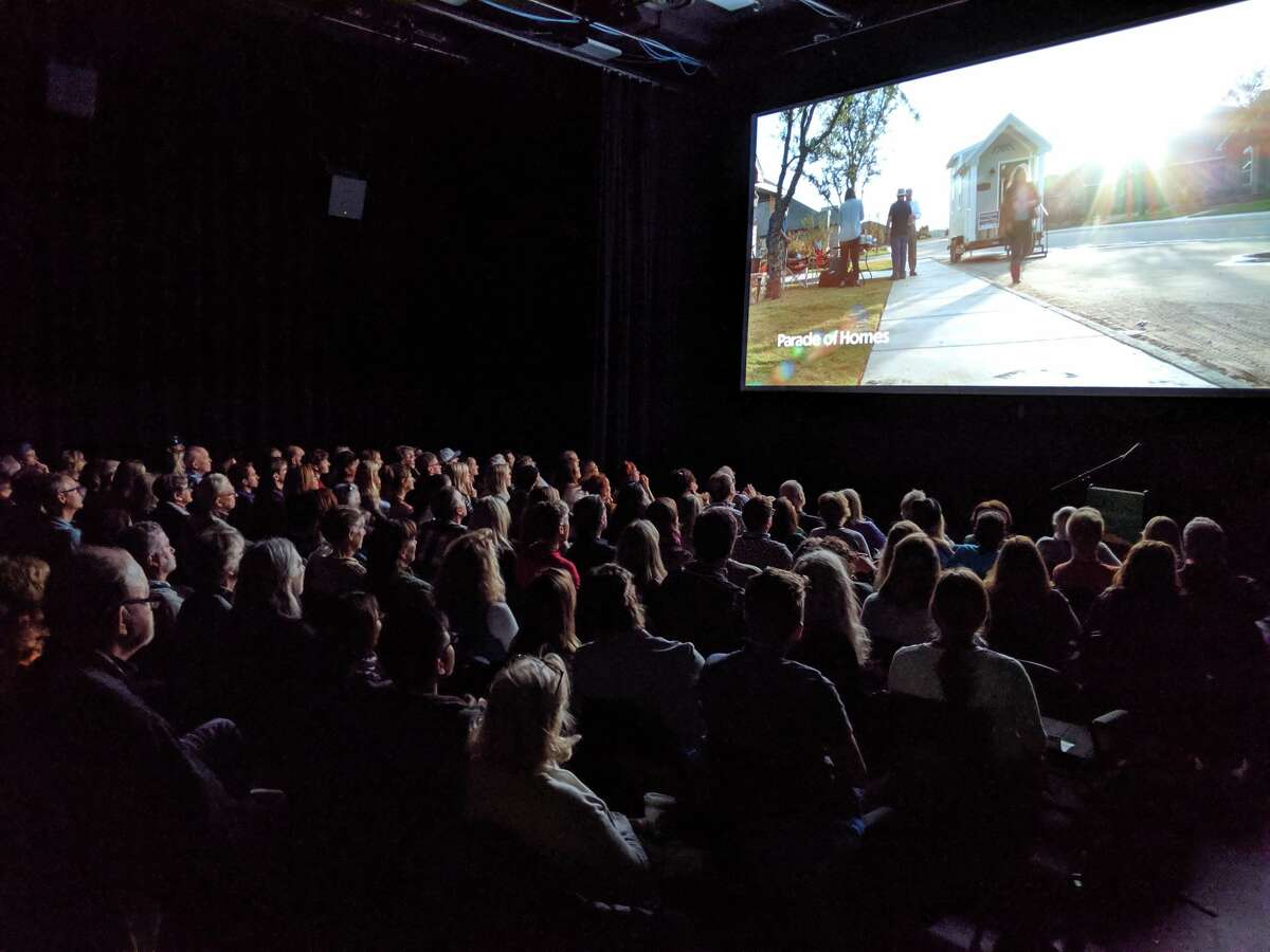A sold out crowd watches “Finding Home in Boomtown” at the Mountainfilm Festival in Telluride, Colorado.