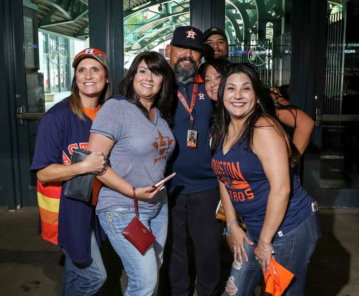 Fans pose for a photo before Game 2 of the American League Championship Series at Minute Maid Park on Sunday, Oct. 13, 2019, in Houston.
