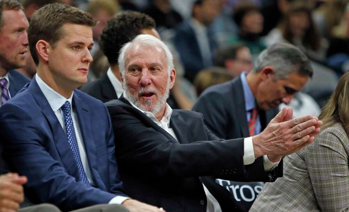 Gregg Popovich head coach of the San Antonio Spurs talks with Will Hardy assistant coach of the San Antonio Spurs during game against theNew Orleans Pelicans on Sunday, October 13, 2019.