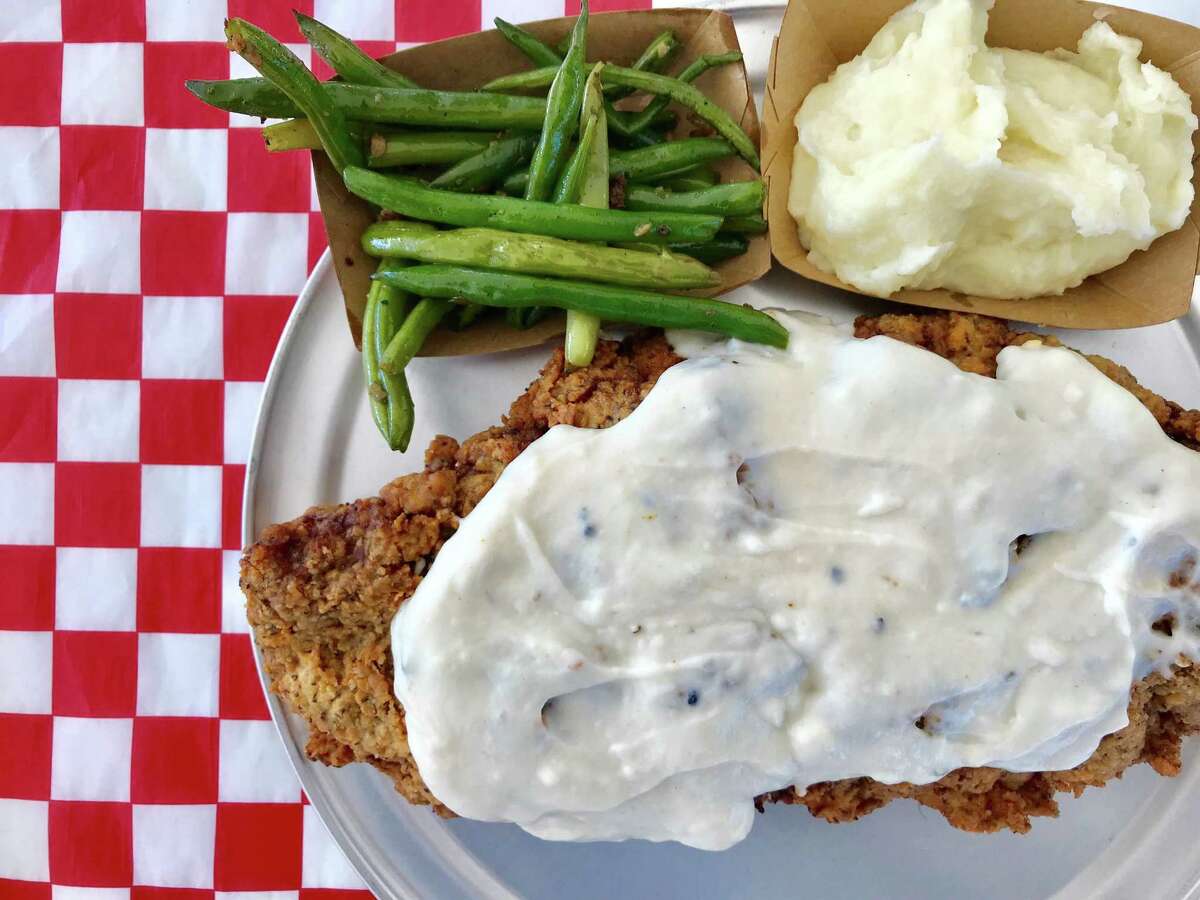 Chicken fried steak with cream gravy, green beans and mashed potatoes from Ronnie Killen's pop-up for Killen's, the restaurant he plans to open in the former Hickory Hollow space at 101 Heights.