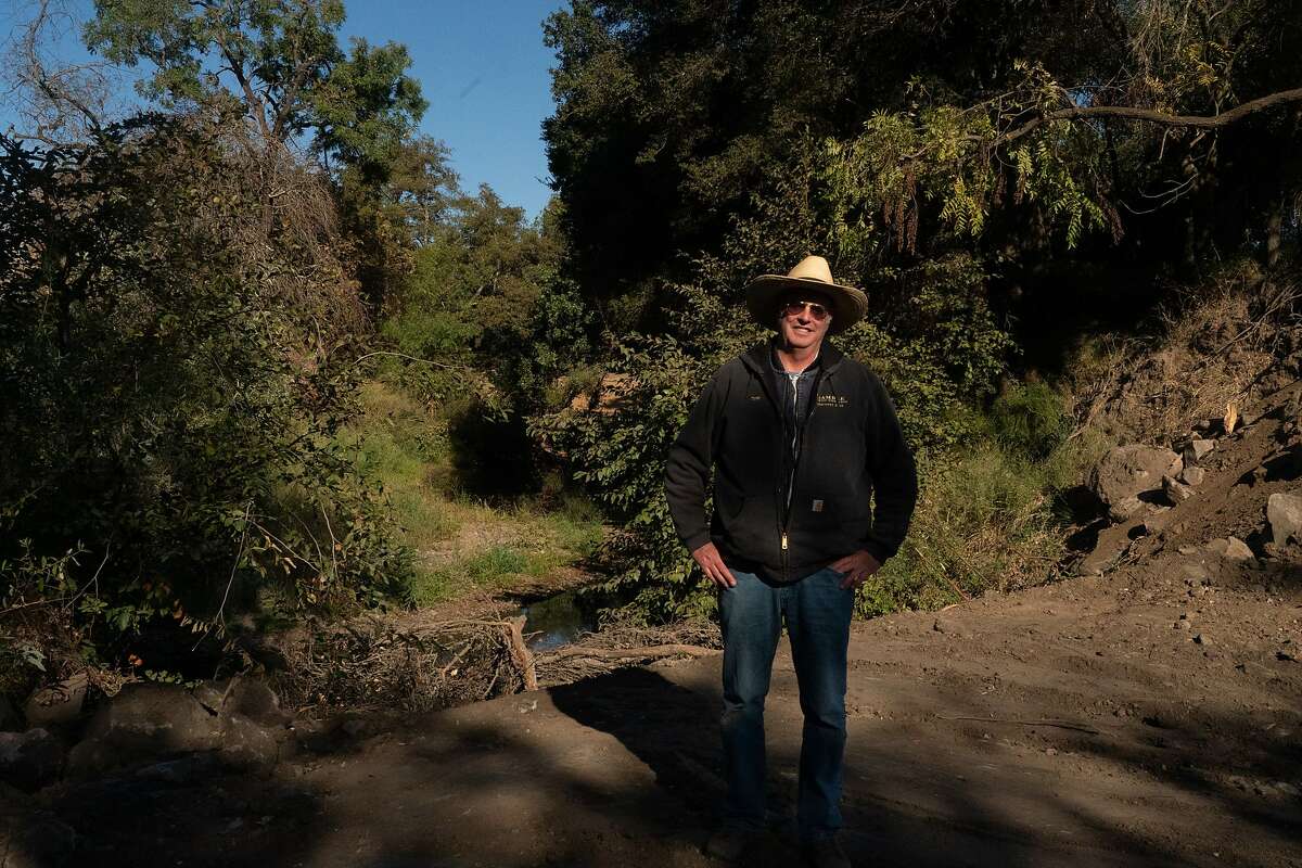 Farmer Tom Gamble with the Napa river running behind him on Saturday, Oct. 5, 2019, in Napa, Calif.