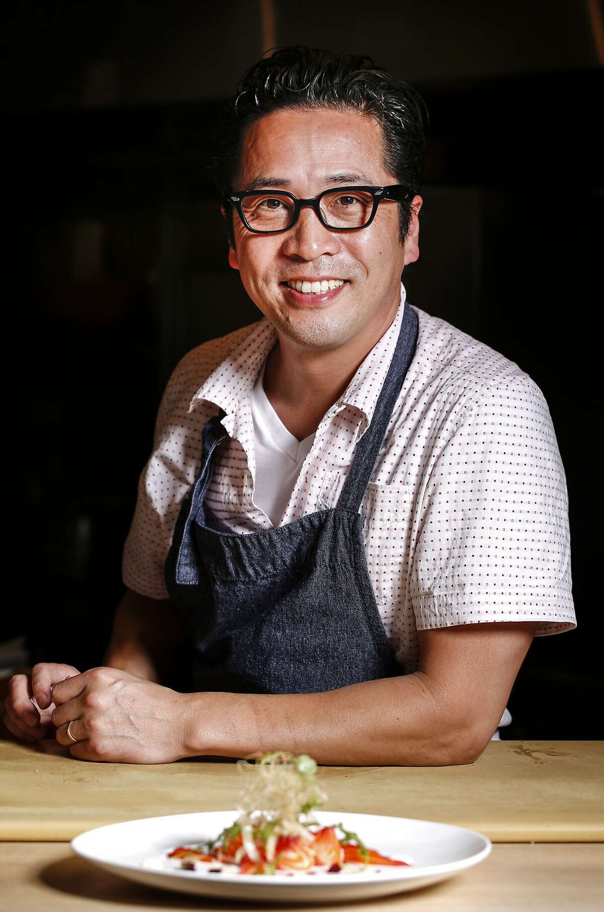 Sho Kamio of Iysasare is seen with his Beet Cured Ocean Trout with Yuzu Aioli on Thursday, July 17, 2014 in Berkeley, Calif.