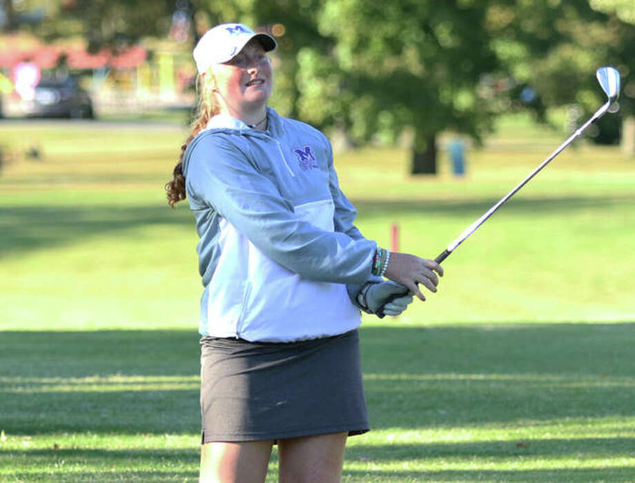 Marquette Catholic’s Gracie Piar watches her shot off the tee on hole No. 18 on Monday at the Mount Carmel Class 1A Sectional at West Berwick golf course. Photo: Greg Shashack / The Telegraph