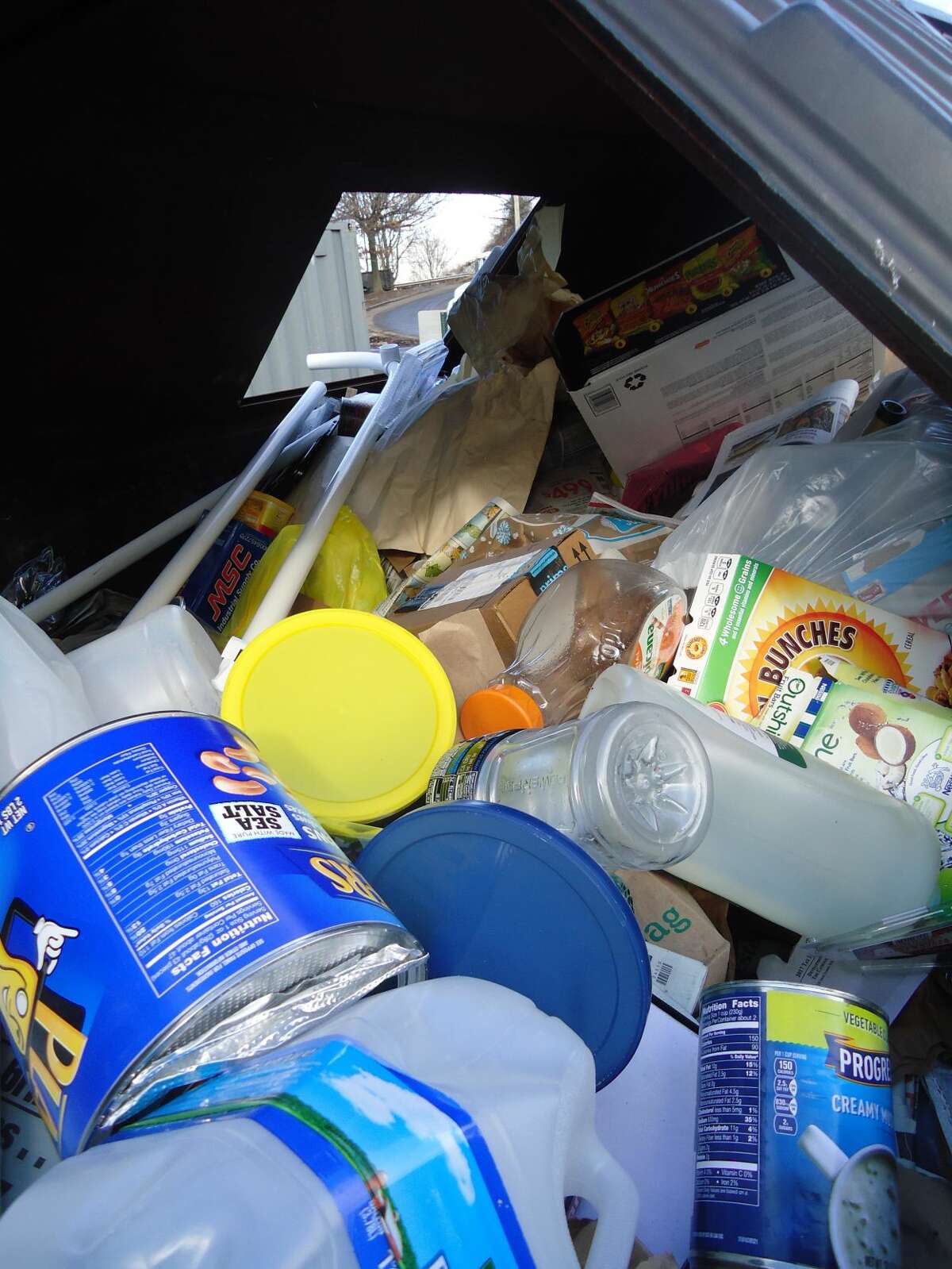 The recycling container in the Stratford Transfer Station on Watson Boulevard. Many of the items here can't be recycled, such as the plastic bags and the PVC pipe.