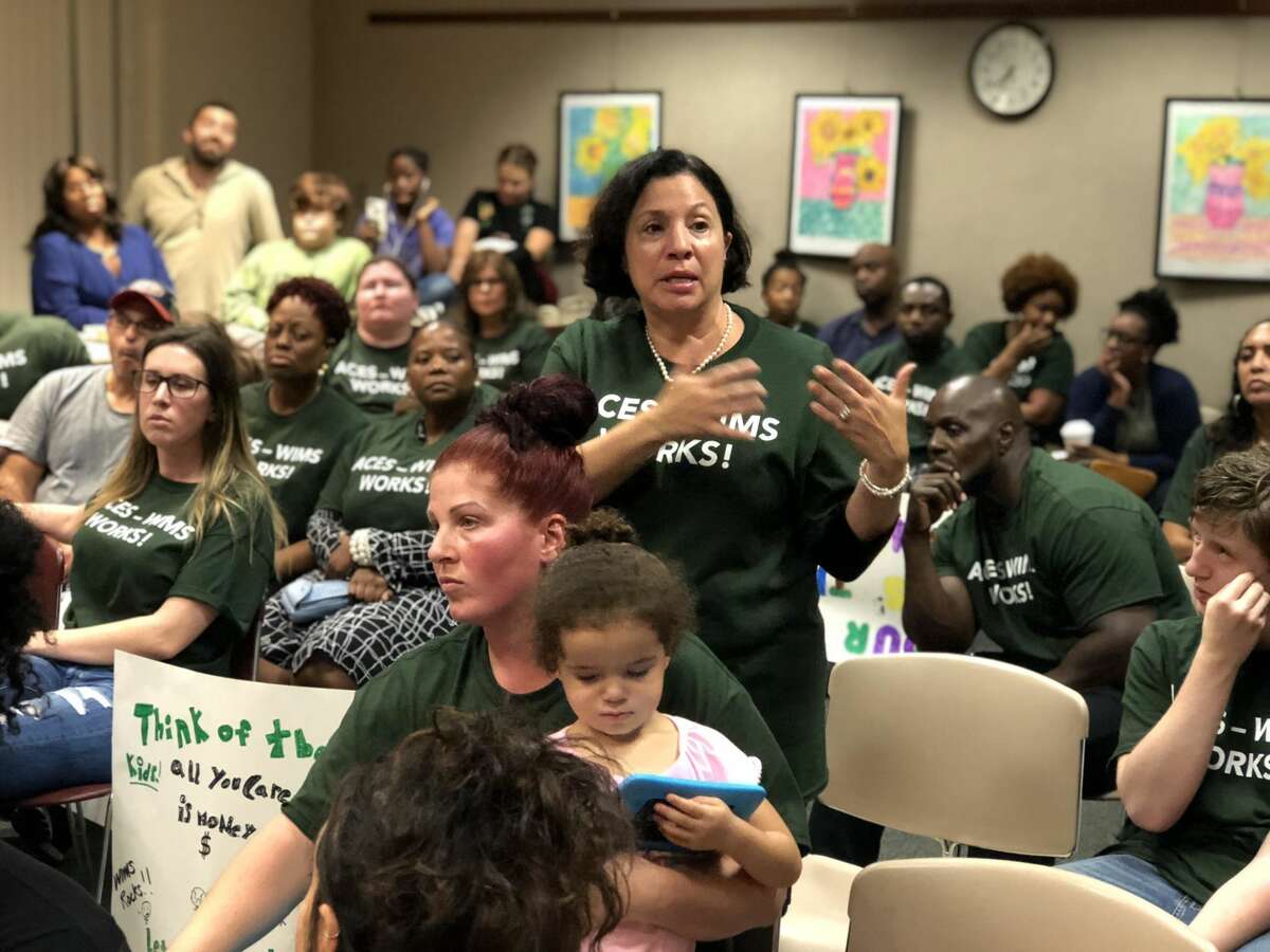 Parents and community members from the Wintergreen Interdistrict Magnet School lobbied the Board of Education not to force students and the program out of the building, as would occur under recent redistricting proposals.