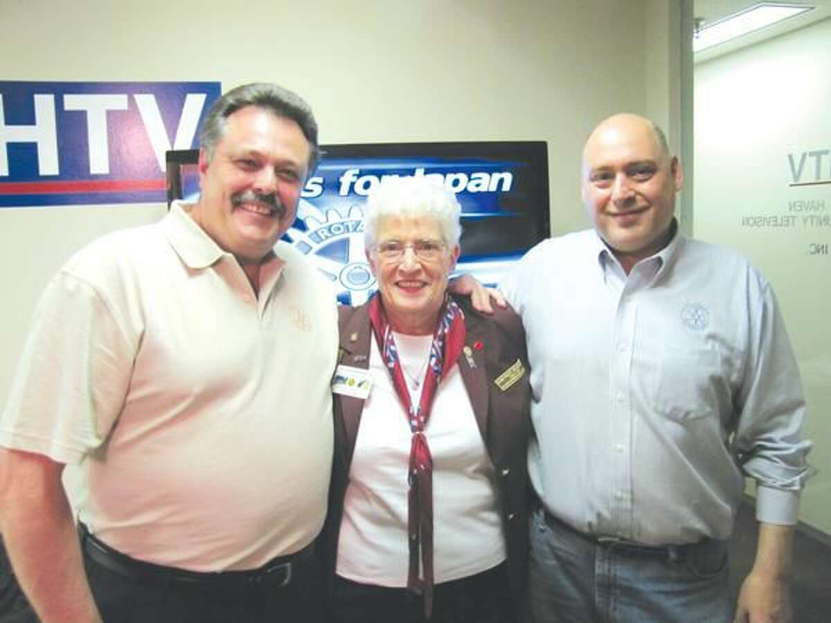 Photos courtesy of David Marchesseault, Rotary Club Secretary Rotary District 7980 Governor Julie Reppenhagen of Sherman, poses with North Haven’s President-Elect Guy Casella, left, and President Rick DiNorscia, right, during the telethon.