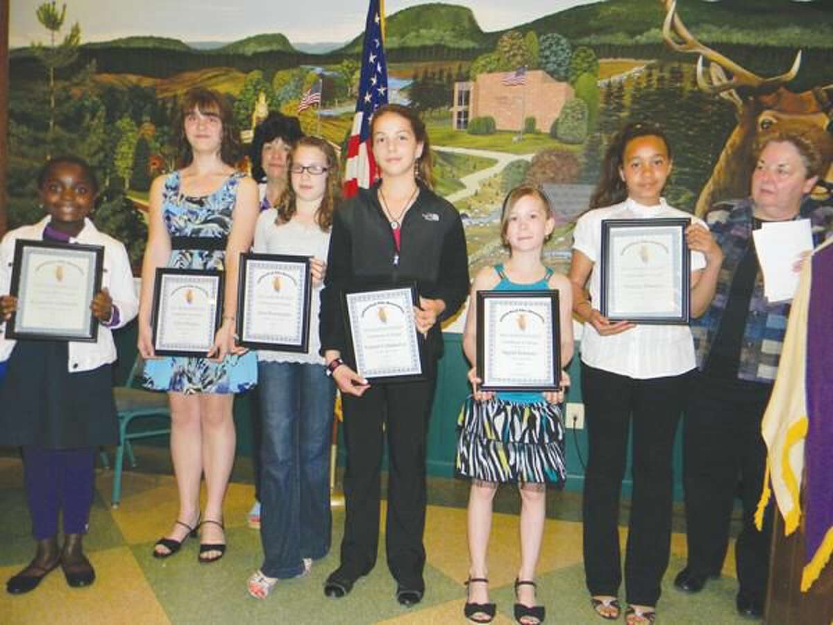 Submitted photo Local winners of the Elks Drug Awareness Poster and Essay Contest and Elks Americanism Essay Contest are shown at the Hamden Elks Youth Banquet in May.