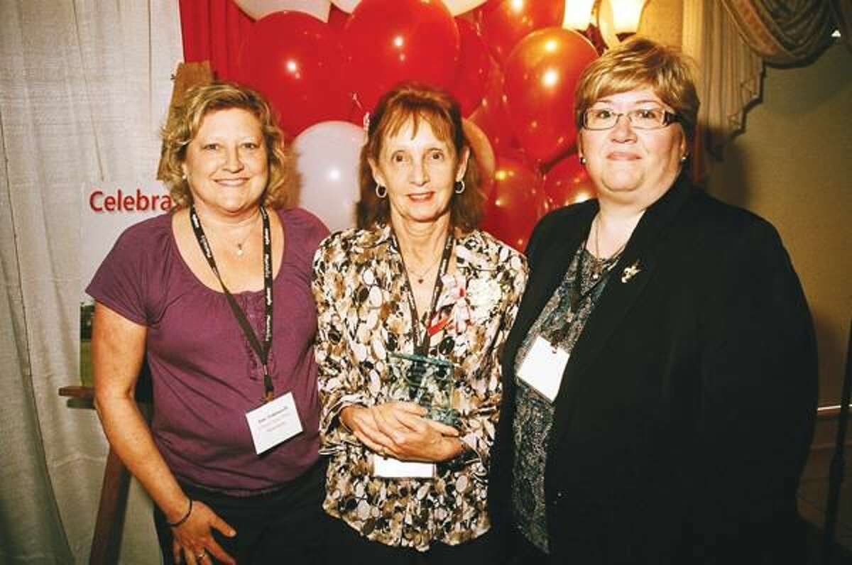 Submitted Photo Left to right, Masonicare Health Center’s Jane Tomasselli, Nurse Supervisor; CNA Joan Houle, recipient of an Employee of the Year Award from CANPFA; and Melinda Schoen, Vice President for Nursing Services, at CANPFA’s 22nd Annual EXPO held at the Aqua Turf Club.