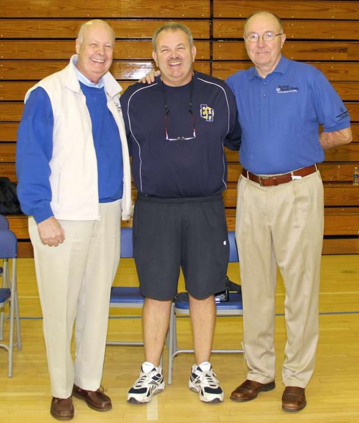 Submitted photo Pictured, from left to right, are Bill McNamara, representing IBM, Jim Reynolds, the director of the tournament, and Jack McDonald, the Athletic Director of Quinnipiac University.