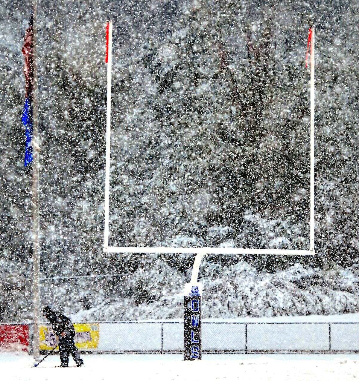 Photo by Arnold Gold Saturday's snowstorm created numerous problems for athletic teams — as shown by this picture of Southern Connecticut State's football field — but even now the lingering aftereffects of the snow are creating headaches for high school programs across the state.