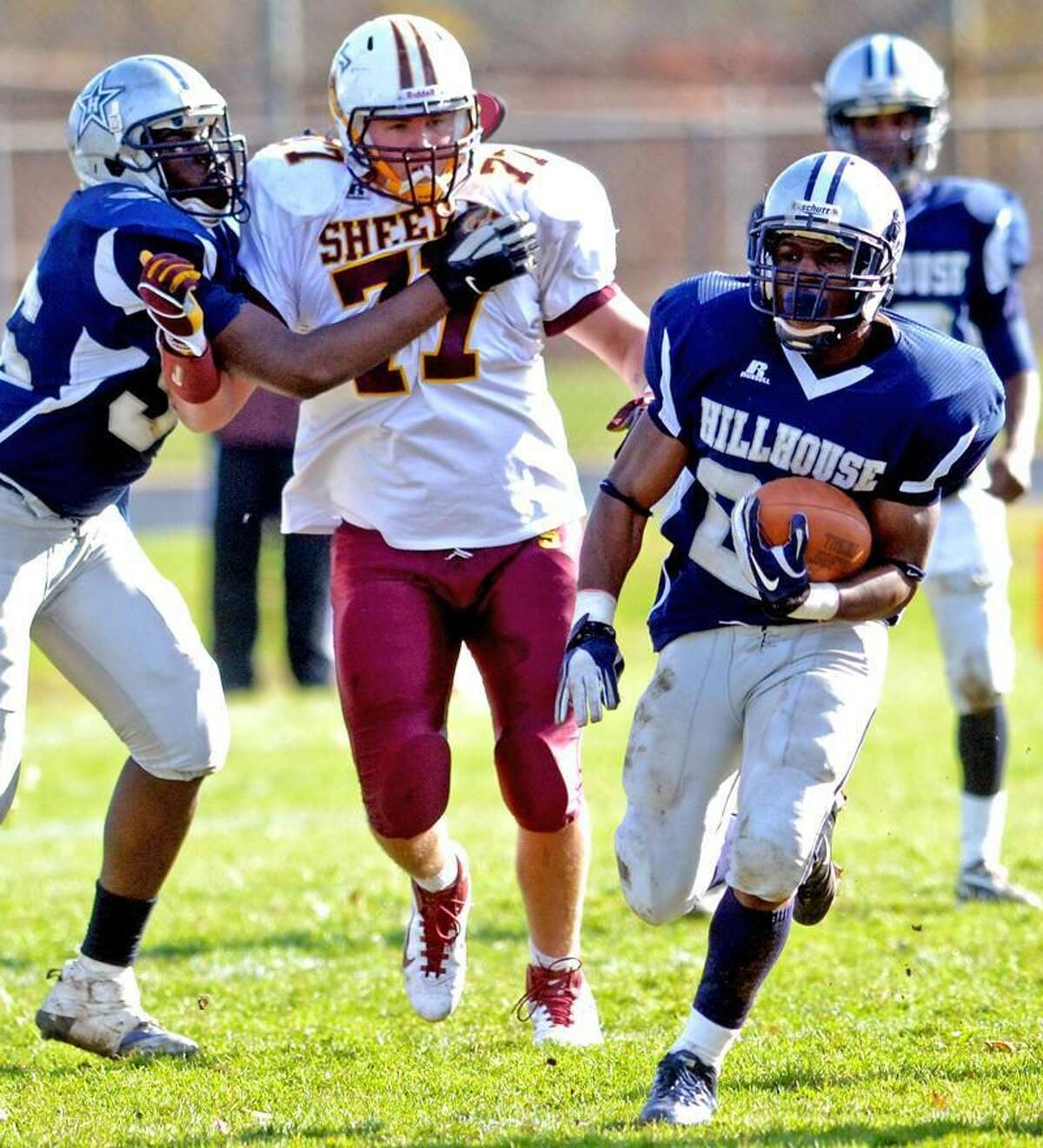 Photo by Sean Meenaghan/Register Hillhouse running back Andre Anderson cut through Sheehan's defense before being stopped on the 10-yard line in the second quarter.