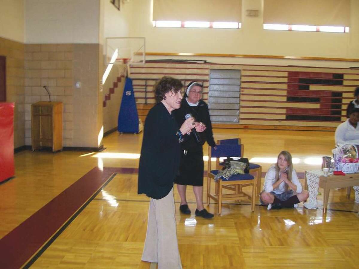 Photo by Lynn Fredricksen Holocaust surviver Anita Schorr, of Westport, addresses Sacred Heart Academy students at a recent Diversity Day held at the school.