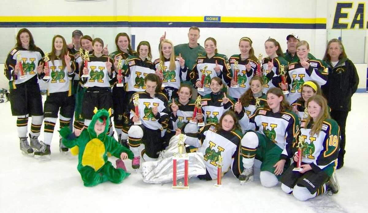 Submitted photo The Hamden girls' U14 hockey team celebrates its Connecticut Girls' Hockey League Division I championhip.