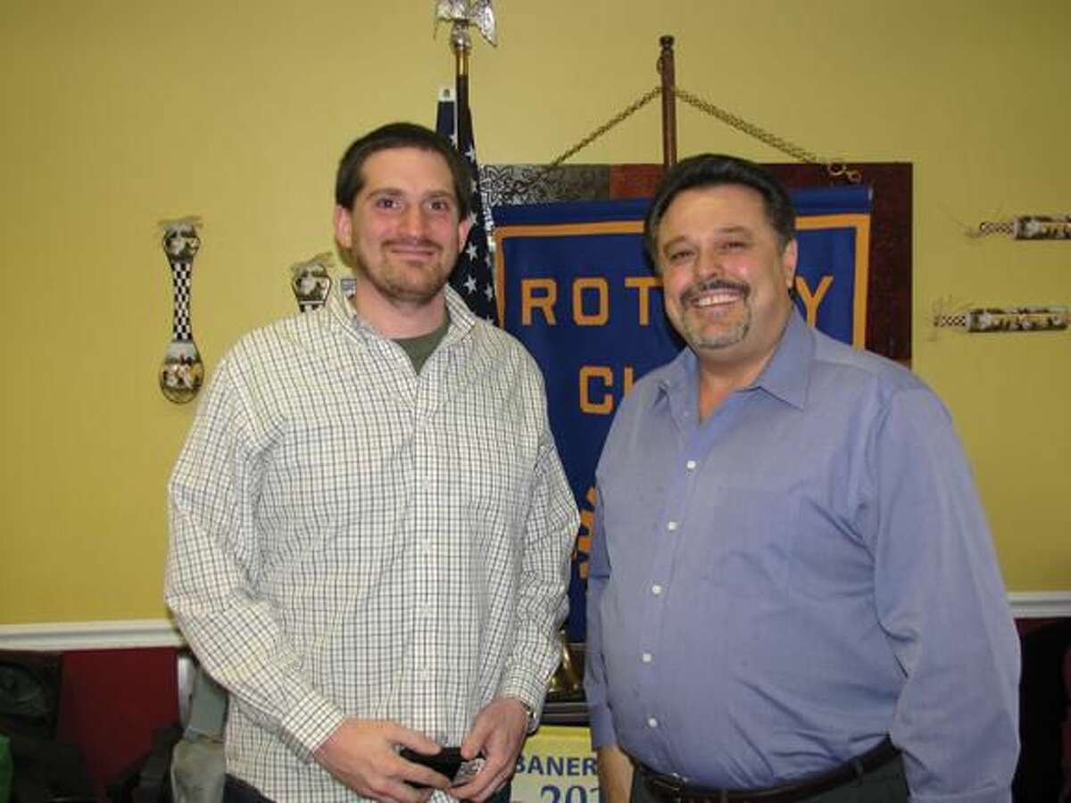 Submitted photo courtesy of David Marchesseault, Rotary PR Chairman Bryan Nurnberger, left, poses with Rotary President Guy Casella at the Breakfast Nook after describing his mission to serve the desperately poor.