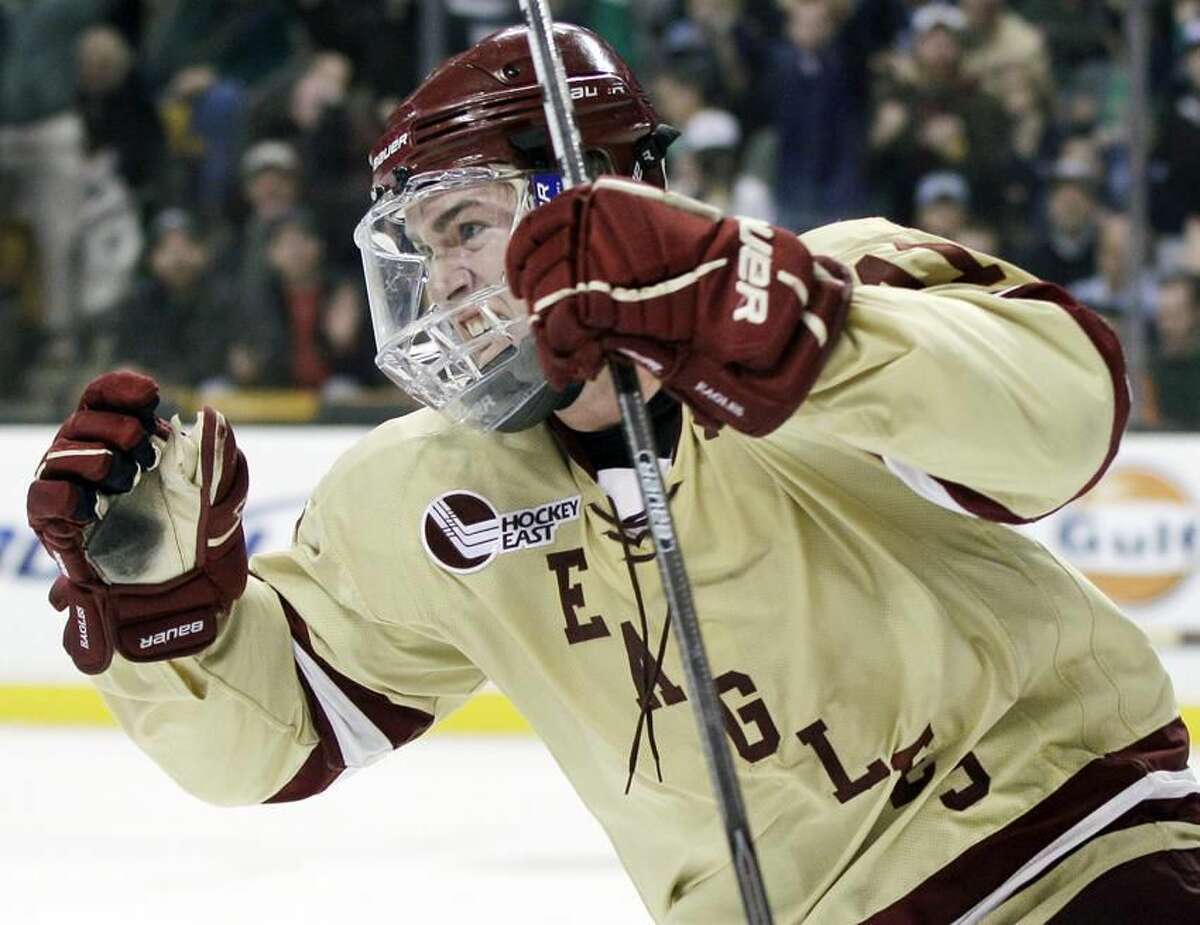 Boston College's Pat Mullane, celebrates his goal against Maine in the second period of an NCAA college Hockey East final in Boston, Saturday, March 17, 2012. (AP Photo/Elise Amendola)