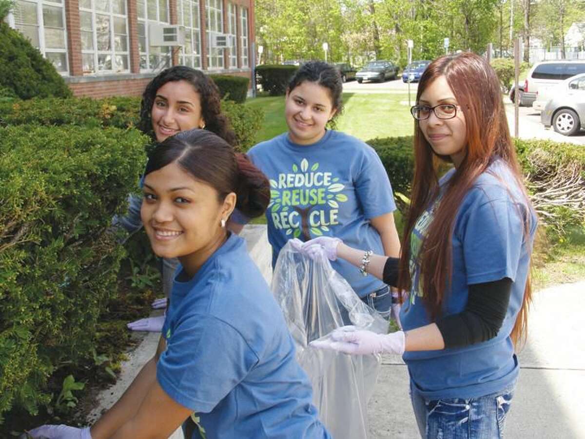 Submitted Photo Senior Young Women at Eli Whitney High School celebrated Earth Day April 24 by cleaning-up the campus and planting flowers. Pictured above, left to right: Amelia Gomez, Lissie Davis, Genesis Rodriguez, and Cristina Garayua.