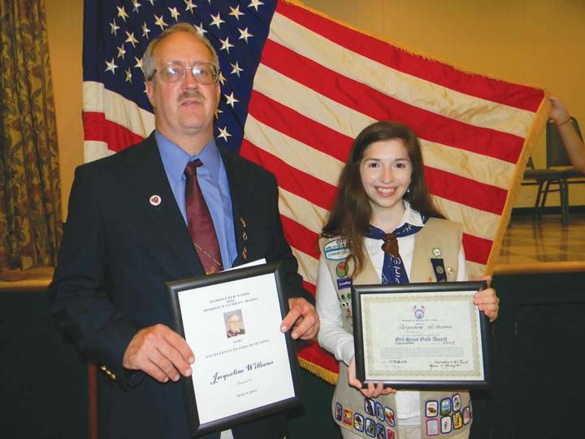 Submitted Photo Exalted Ruler Carl Gorman and Curran Award recipient Jacqueline Williams.