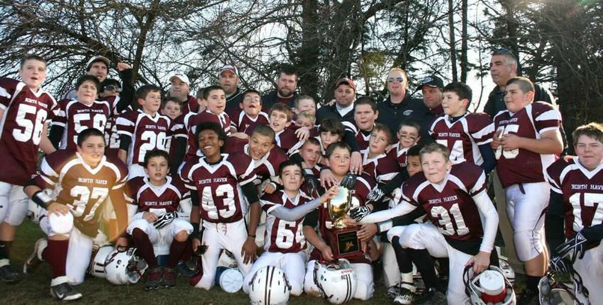 Submitted photo The North Haven fifth-grade team celebrates its Shoreline Youth Football Conference championship after beating Cheshire 24-7 in the title game.
