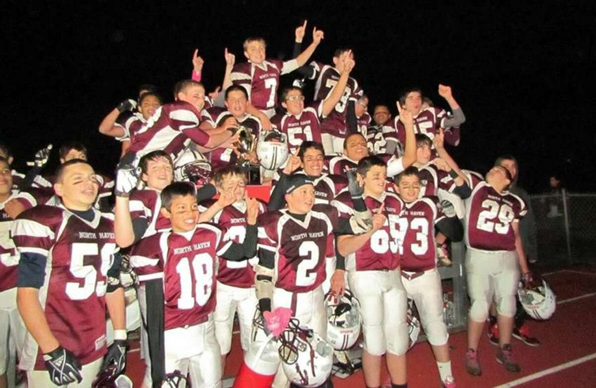 Submitted photo The North Haven seventh-grade football ream won its second straight Shoreline Youth Football Conference championship with a 30-0 win over previously-undefeated Madison.