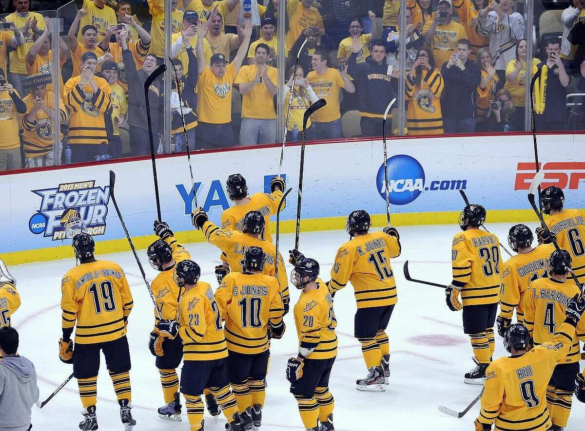 Pittsburg, PA— The Quinnipiac team waves to their fans after they beat St. Cloud 4-1 to advance to the National Championship game against Yale. Photo-Peter Casolino/Register pcasolino@newhavenregister.com