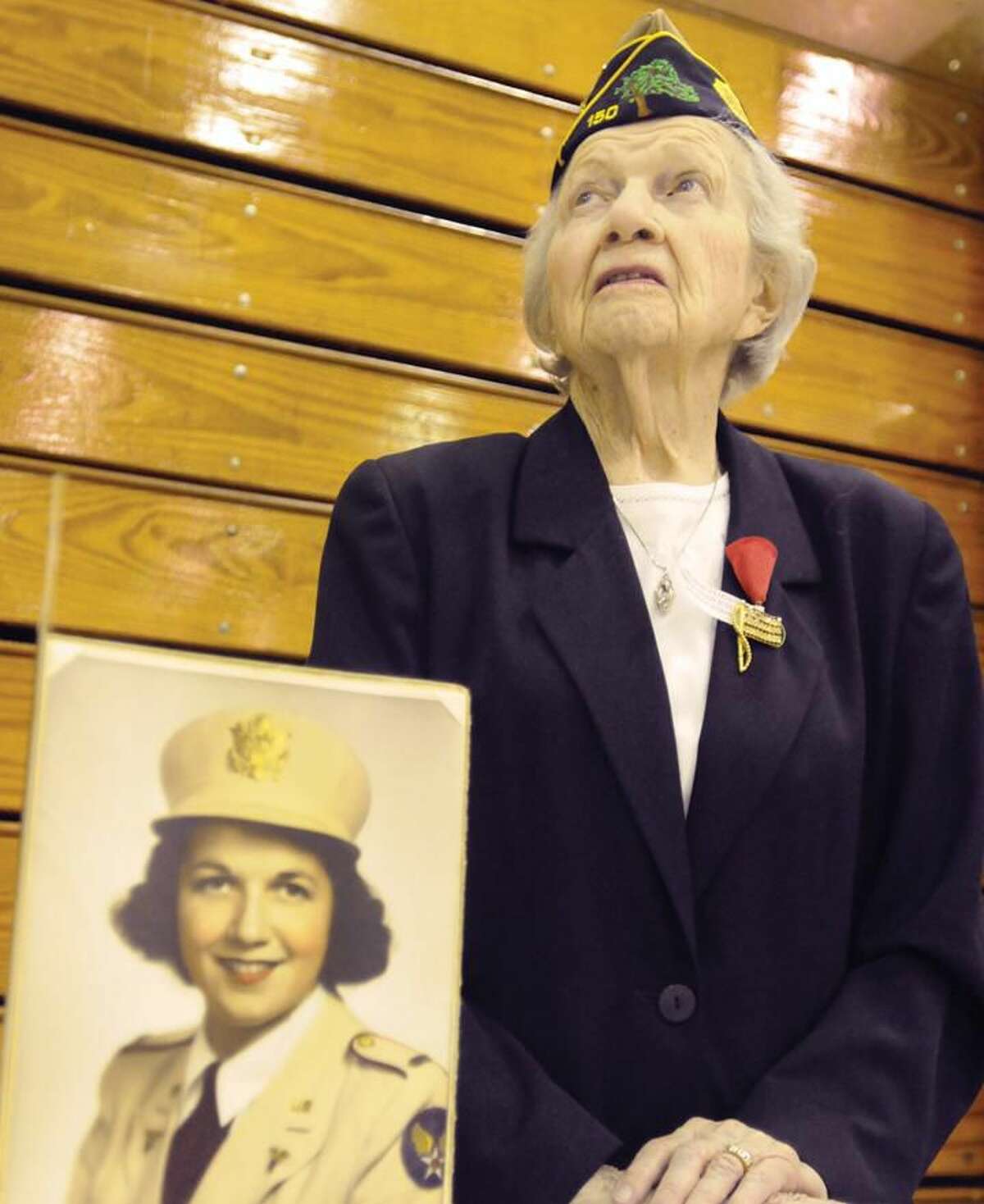 World War II Army Nurse Florence Donovan Krukowski of Hamden, 90, a past Commander of American Legion Post 150 stands ready to talk to over 450 Hamden middle and high school students who were bused to the Hamden Veterans Awareness Day at Quinnipiac University Friday May 24, 2013, a Hamden Veterans Commission sponsored Memorial Day event which was dedicated to the memory of all of America's Veterans. With tributes and presentation by speakers, the students also viewed Veteran's exhibits from different wars and historical eras of the United States. The event also gave students the opportunity to interact with Veterans from World War II to the present War on Terror. Photo by Peter Hvizdak / New Haven Register.
