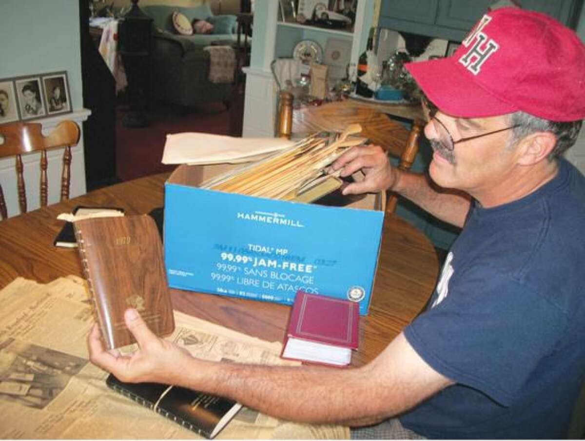 Submitted Photo Ted Stockmon, who rescued several boxes of memorabilia from a dumpster, is still discovering treasures in each one. He’s amassed a collection of vintage newspapers, negatives, appointment books and complaint logs that date from the 1940s through the 1980s.