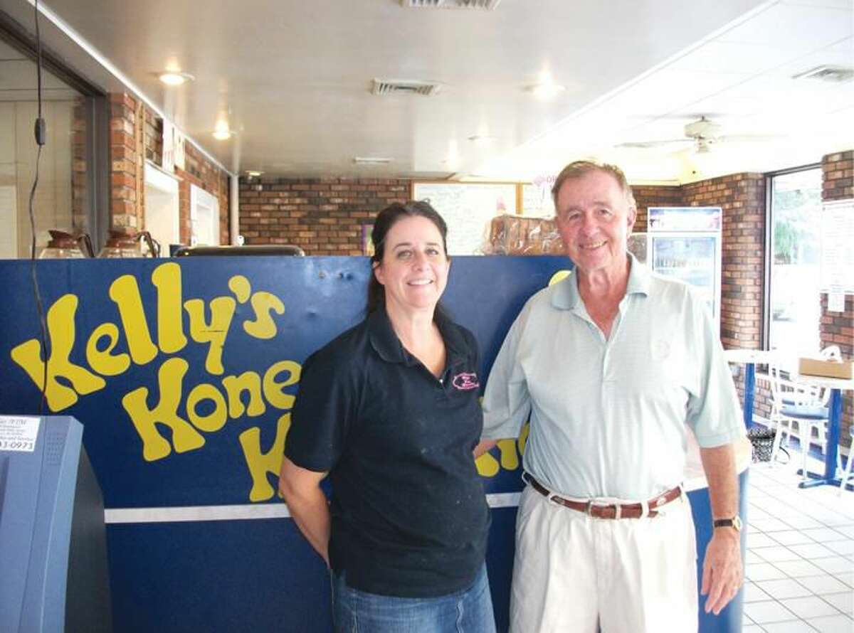 Photo by Lynn Fredricksen Kelly Ciccone and her father, Wayne Stone, took a few minutes to chat at Kelly’s Kone Konnection recently. Ciccone owns the well-loved ice cream store located within her father’s Glenwood Drive In restaurant at 2538 Whitney Ave. in Hamden.
