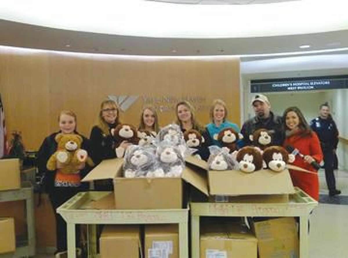 Submitted Photo courtesy Yale New Haven Hospital The Jacques family and friends deliver 70 stuffed monkeys to Yale New Haven Children’s Hospital. Pictured left to right: Julia Brock, Cynthia Brock, Mandy Brock, Melissa Jacques, Erica Bailey (Yale Child Life), Alphonse Jacques, and Stephanie Siomni (WTNH).
