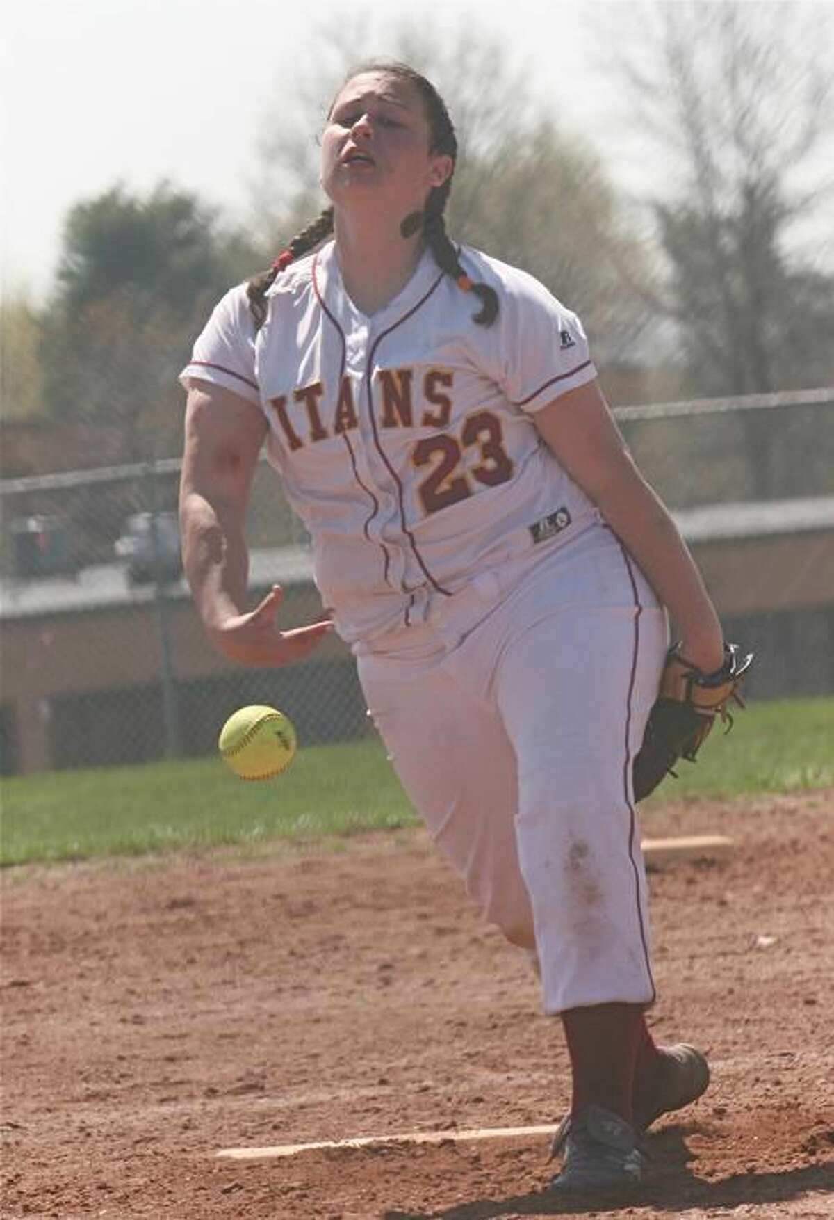 Sheehan’s Dani Thuerling delivers a pitch in a game played last season. The Titans opened the 2010 campaign with a 4-3 loss to Guilford but bounced back to post its first win over Mercy-Middletown in years. It was also new coach Jocelyn Chang’s first victory. (File photo by Russ McCreven)