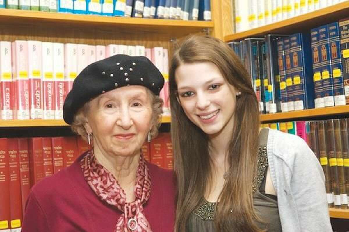Submitted Photo North Haven High School junior Dana Lefland, right, and Esther Schwartzman, a Holocaust survivor living in New Haven, are participants in the national “Adopt-A-Survivor” program.